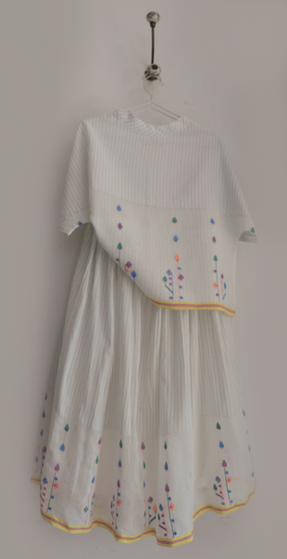 Spring Bloom skirt and top ensemble by INDIGO DREAMS featuring a floral print and lightweight fabric, perfect for warm weather.