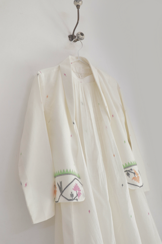 INDIGO DREAMS Tamara Jacket ensemble featuring a stylish, fitted jacket with detailed stitching and modern design.