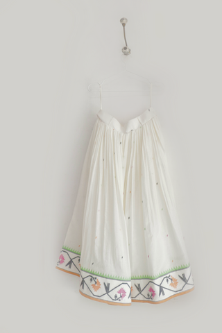 INDIGO DREAMS Tamara Skirt ensemble featuring a stylish, flowy skirt with intricate patterns and vibrant colors.