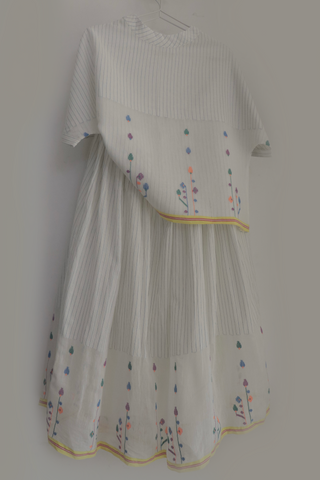 Spring Bloom skirt and top set by Indigo Dreams, featuring a floral ensemble with a fitted skirt and matching blouse.