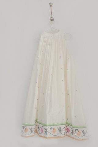 INDIGO DREAMS Tamara Dress ensemble featuring a stylish, elegant dress with intricate detailing and flowing fabric.