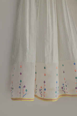 INDIGO DREAMS Spring Bloom Dress ensemble featuring a floral patterned dress with a fitted waist and flowing skirt, perfect for spring.