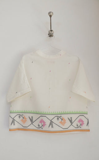 INDIGO DREAMS Tamara Top ensemble featuring a stylish, fitted top with intricate detailing, perfect for casual or semi-formal wear.